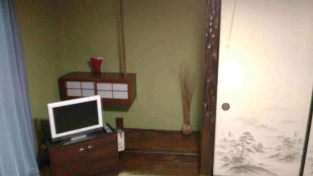 Japanese-Style Family Room with Shared Bathroom